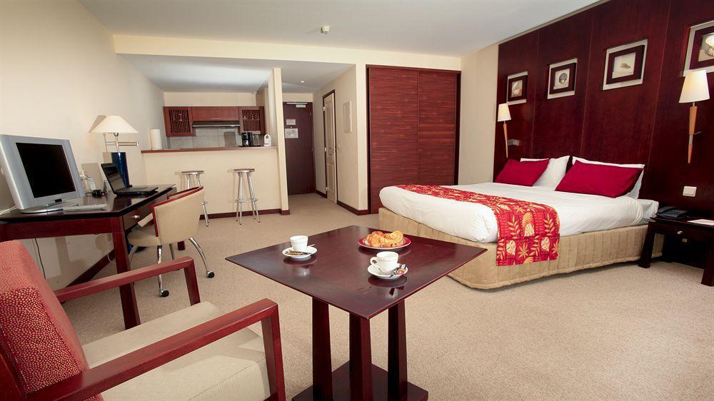 Ramada Hotel & Suites By Wyndham Нумеа Номер фото
